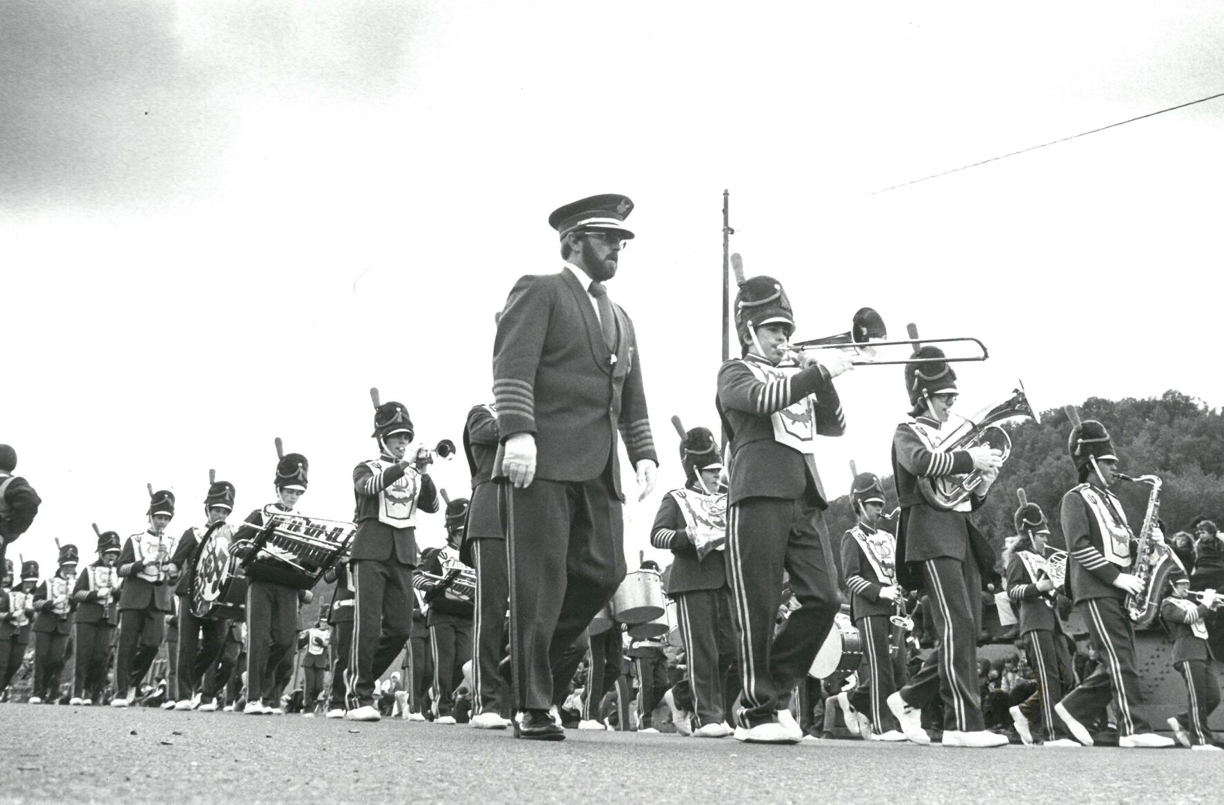 Carl Jenkins leads the Drury High School marching band in the Fall Foliage Parade. Date unknown.